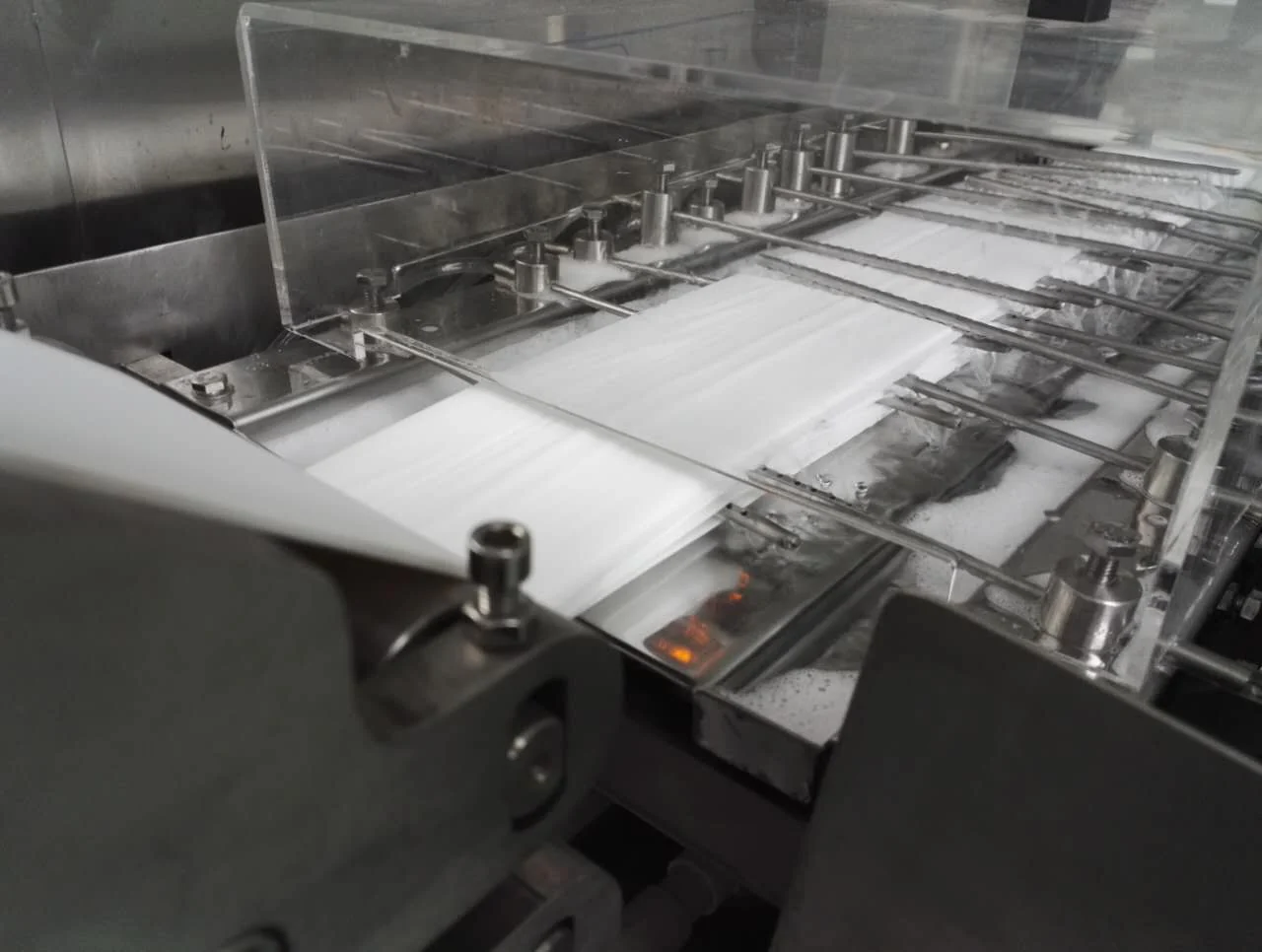 Close view of a wipe folding production line from the supplied company photos